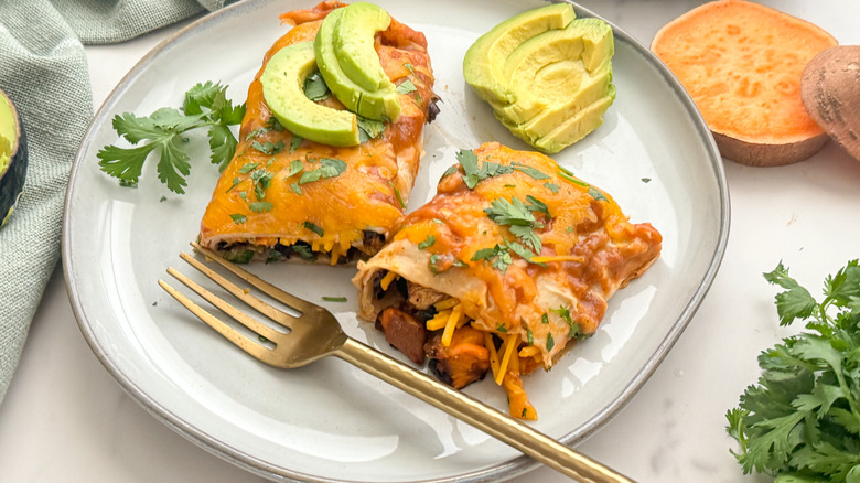 cut enchilada on plate