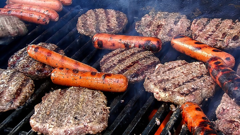 Hamburgers, hot dogs on grill