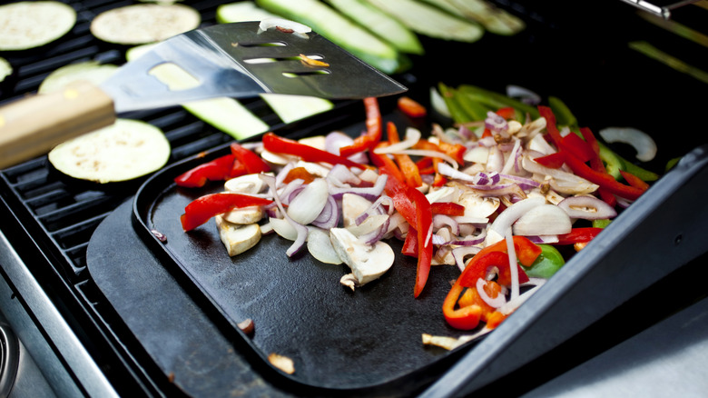 Vegetables grilling on griddle