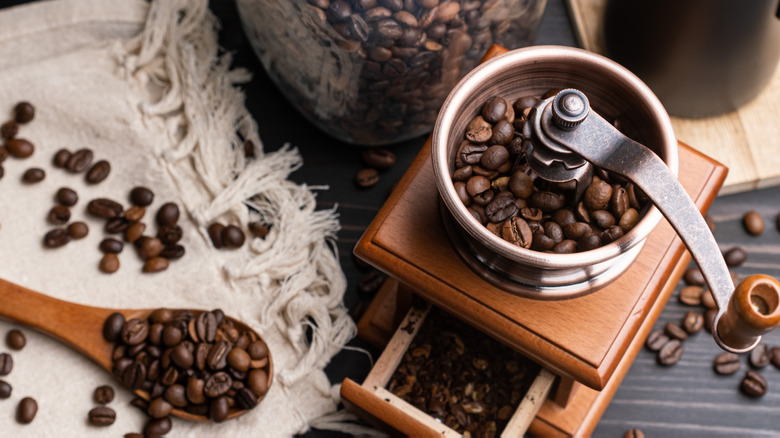 Coffee beans in a grinder