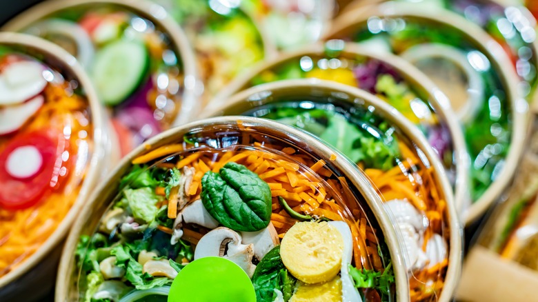 prepackaged salads in a row