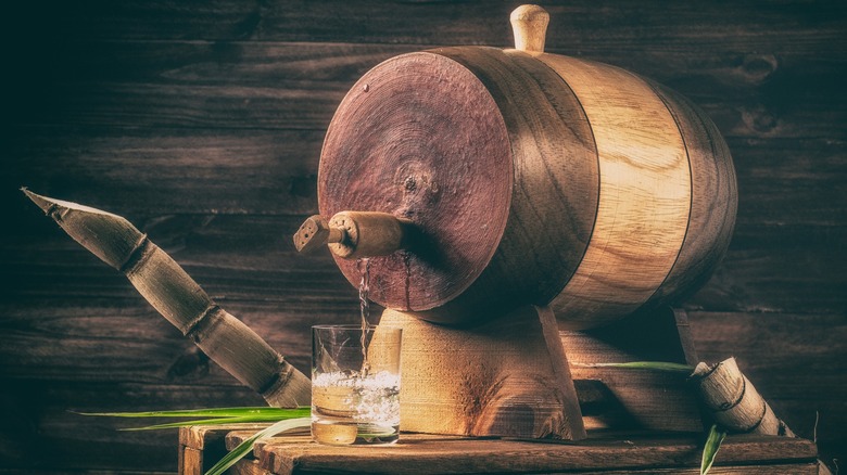 A Brazilian rum barrel dispensing rum into a glass
