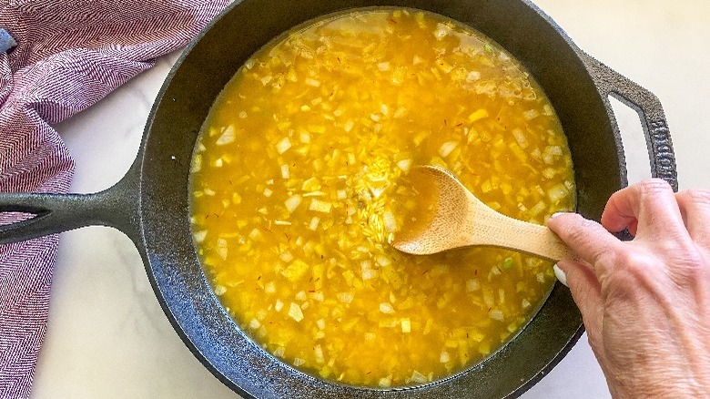 rice mixture in cast iron skillet