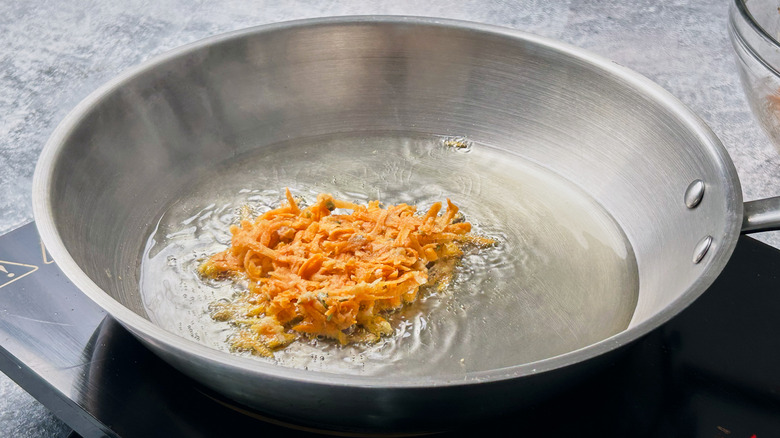 frying latke in skillet