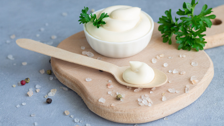 Mayo in spoon and ramekin