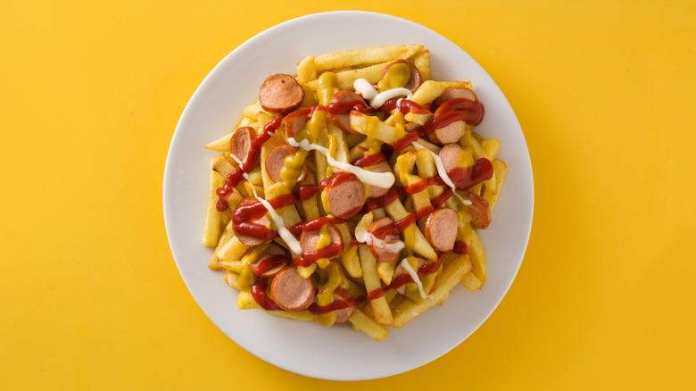 Salchipapas on a plate