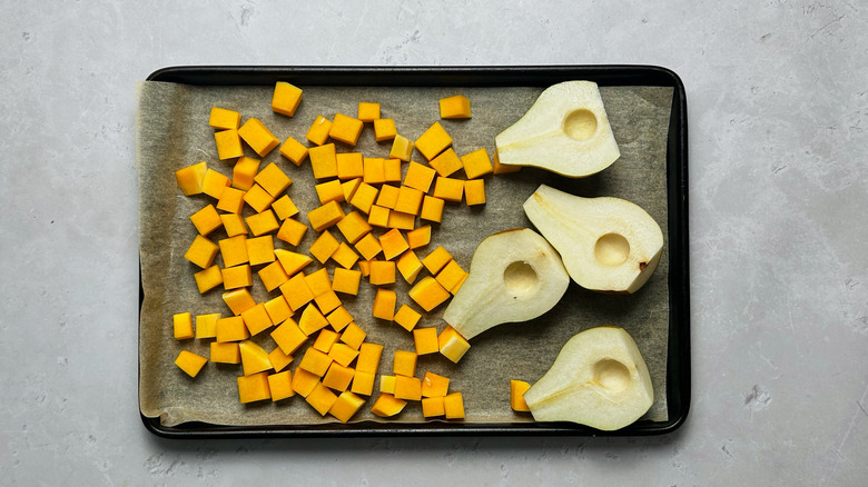 squash and pears on baking sheet