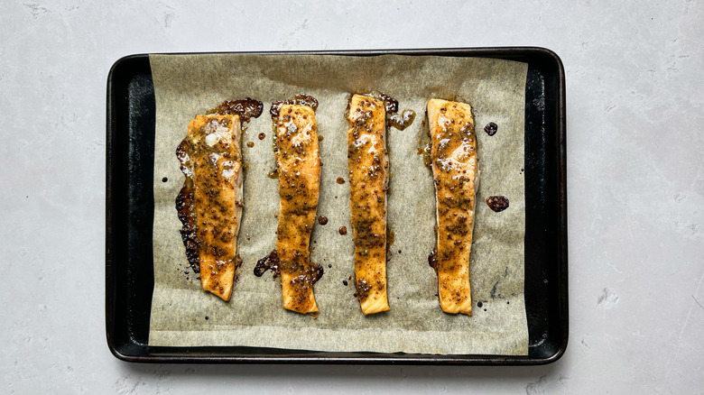 baked salmon on sheet tray