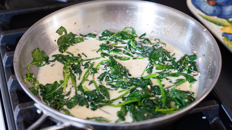 spinach cream sauce in pan