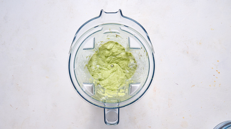 blended avocado crema in blender