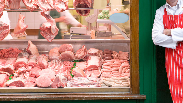 Butcher shop window with meats