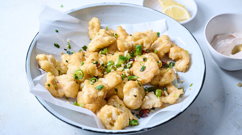 salt and pepper catfish in bowl