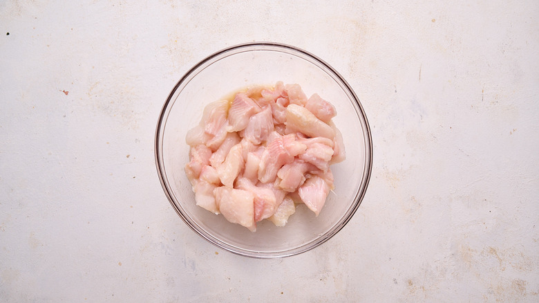 marinating catfish in bowl