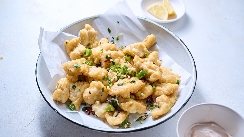 salt and pepper catfish in bowl