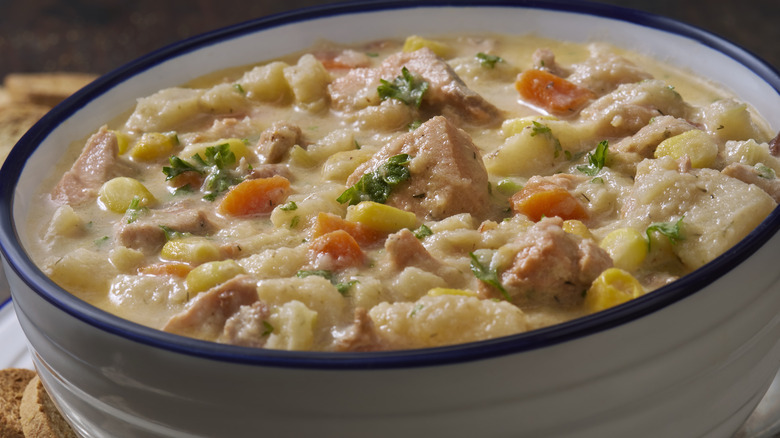 Bowl of creamy fish chowder with salt pork