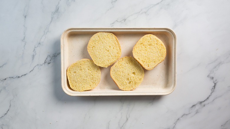 Buns on baking sheet