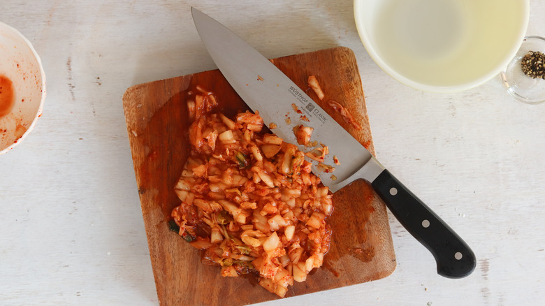 chopped kimchi on cutting board