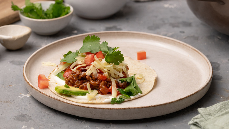 assembling sloppy joe tacos