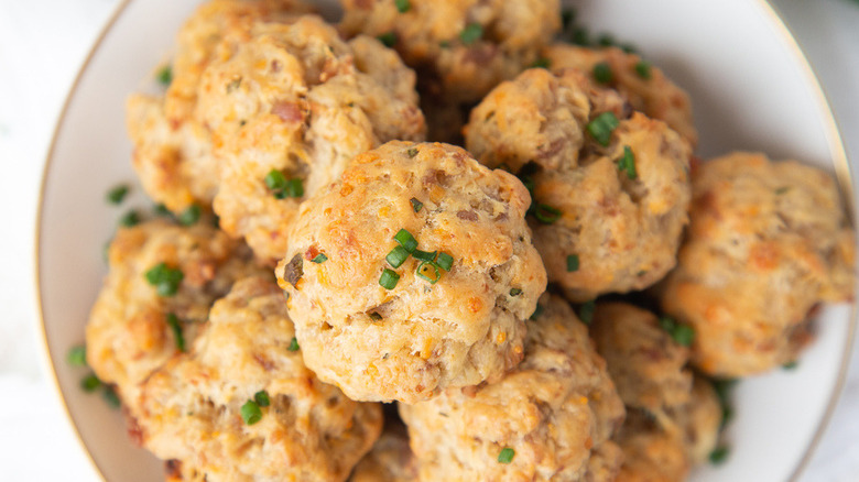 sausage balls stacked on plate