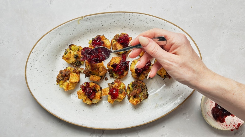 topping stuffing bites with cranberry