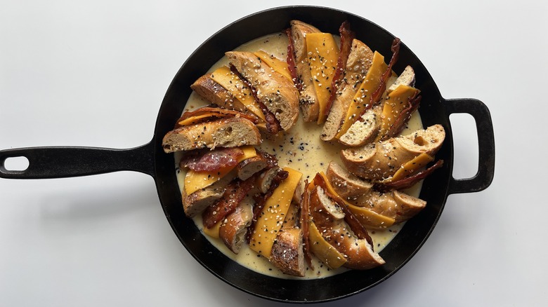 uncooked bagel casserole in pan