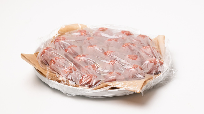 meatballs covered with plastic wrap