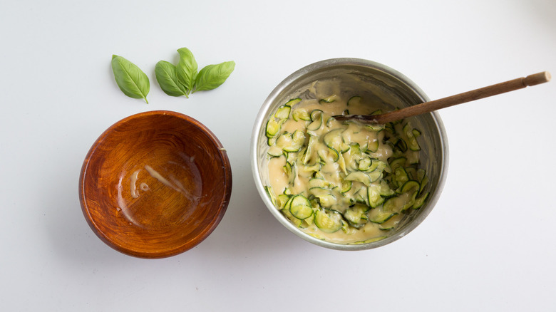 sliced zucchini in cake batter