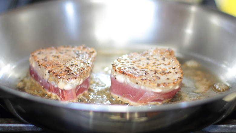 Searing tuna in a skillet