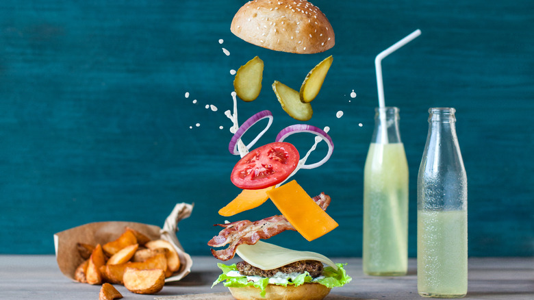 Layers of a burger suspended midair