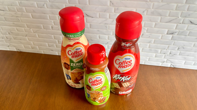 3 Coffee Mate creamer bottles