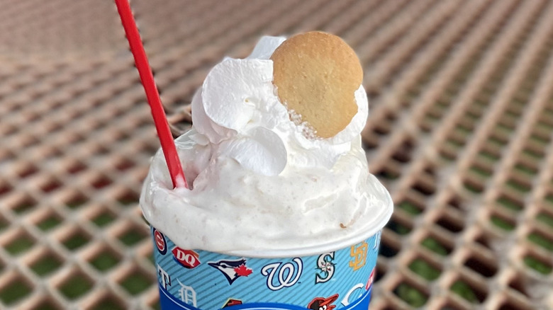 a blizzard topped with whipped cream and a Nilla wafer