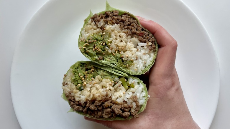 beef broccoli wrap in hand