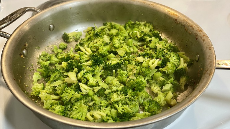 cooked broccoli florets in skillet