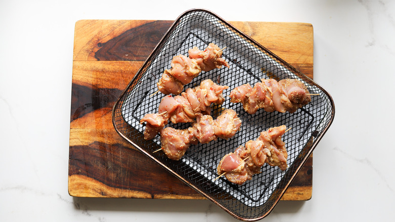 Marinated chicken with bamboo skewers