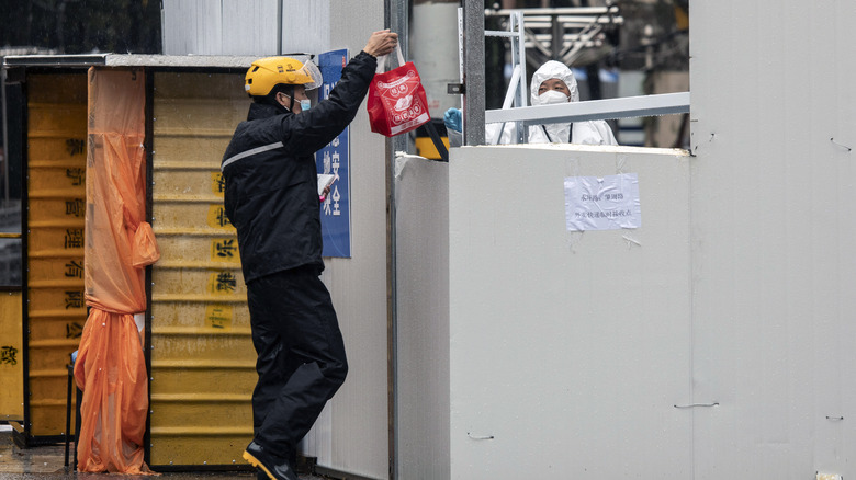 delivery driver supplies a quarantined zone