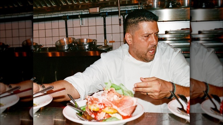 Joe Isidori serving up Italian dish