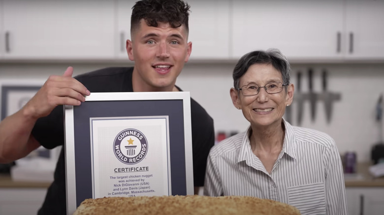 Nick DiGiovanni holding Guinness World Record award