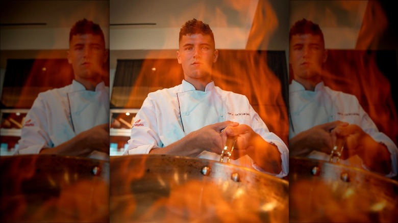 Nick DiGiovanni with flaming pan