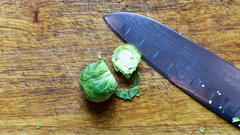 Brussels sprout with knife