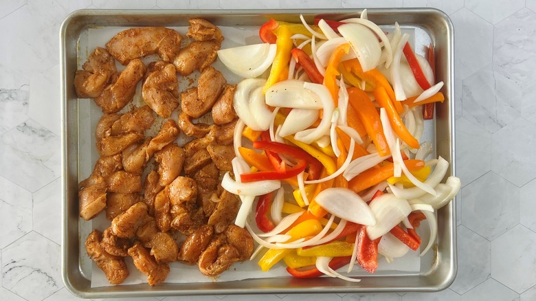 chicken and vegetables in pan