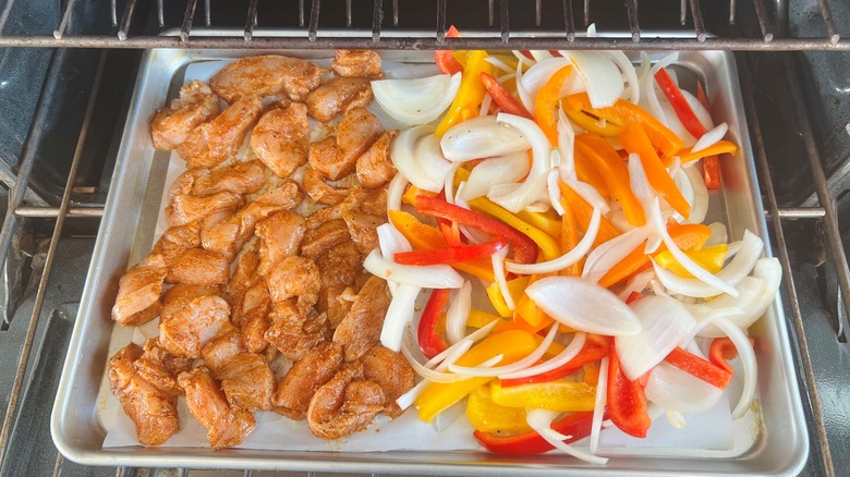 chicken and vegetables in pan