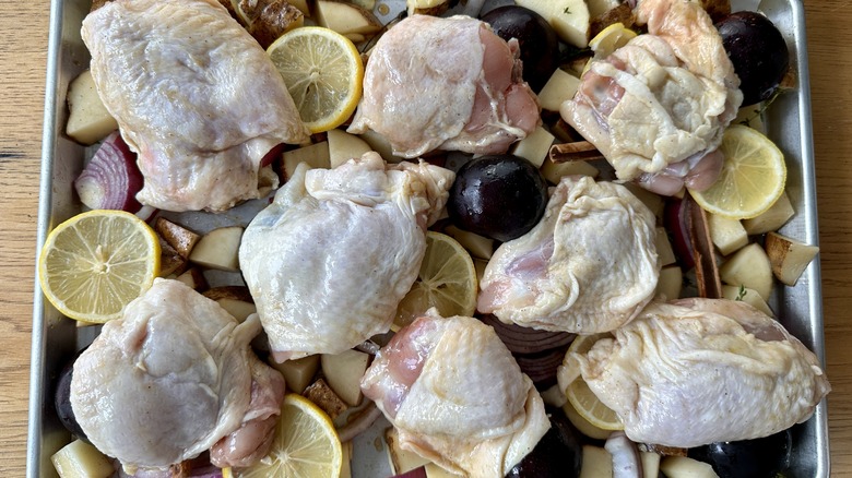 raw chicken in sheet pan