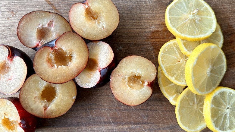 sliced plums and lemons