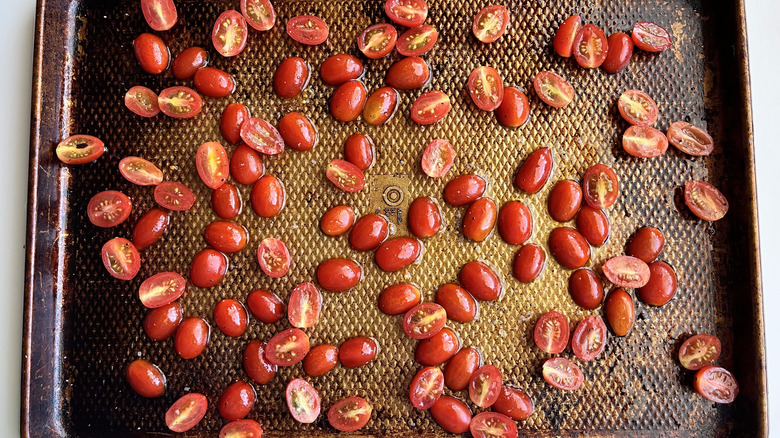 halved cherry tomatoes on tray