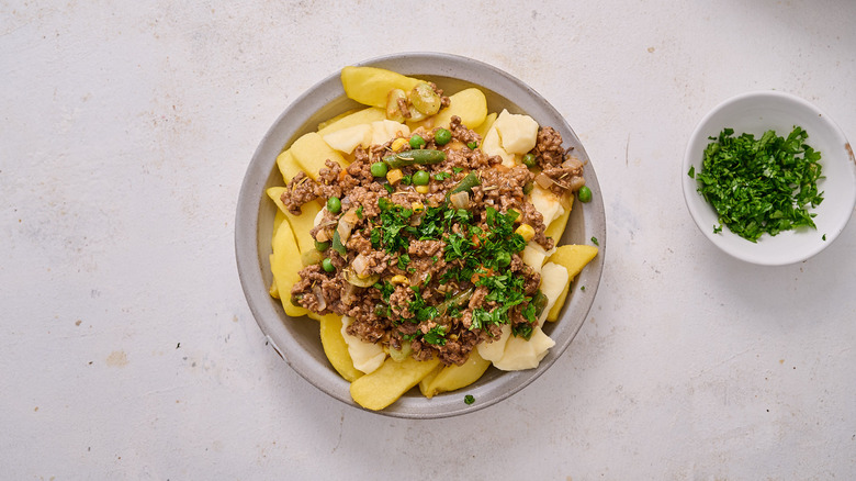 gravy and parsley on poutine