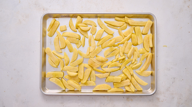 frozen french fries on sheet tray