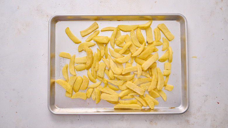 baked french fries on sheet tray