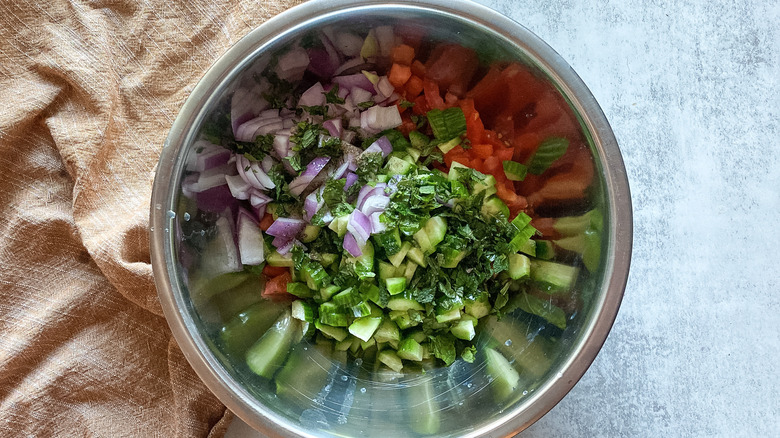 shirazi salad ingredients in bowl