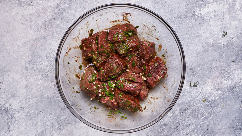 beef marinating in bowl