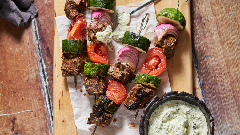 shish kabobs on table